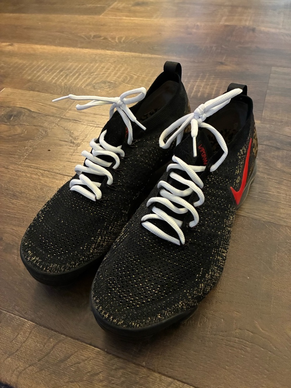Nike Men’s Black Knit Sneakers with Red Swoosh and White Laces